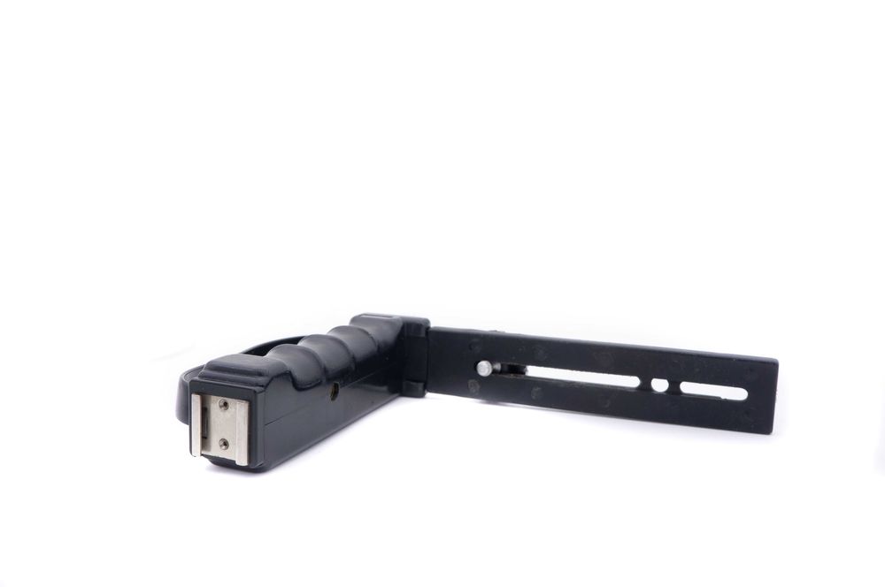 Sina cu grip pentru aparat foto si blit ( mana stanga)