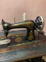 masina de cusut singer