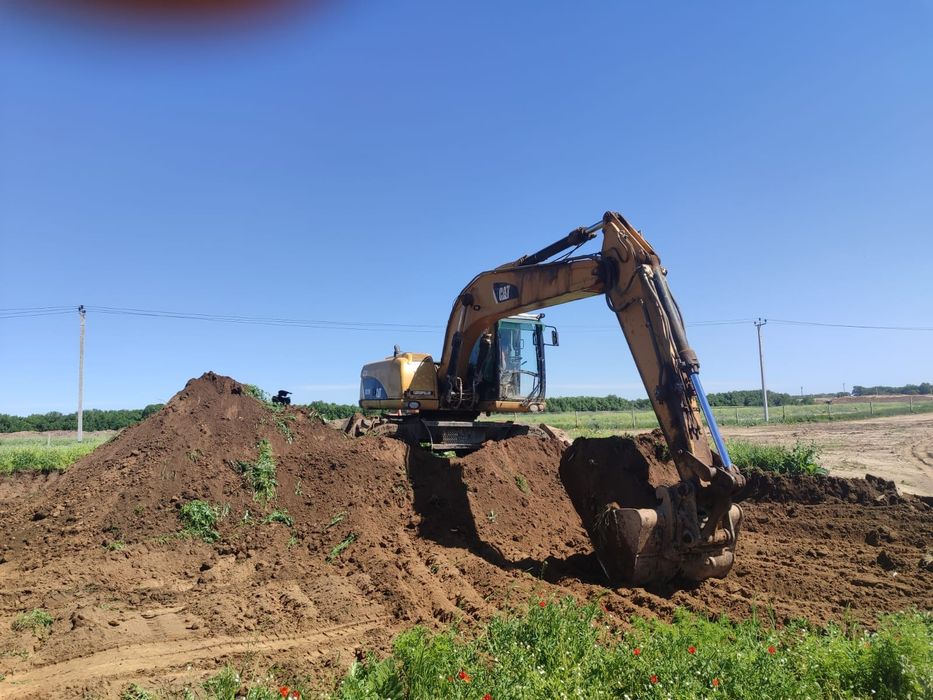Продам колёсный экскаватор Caterpillar M318D