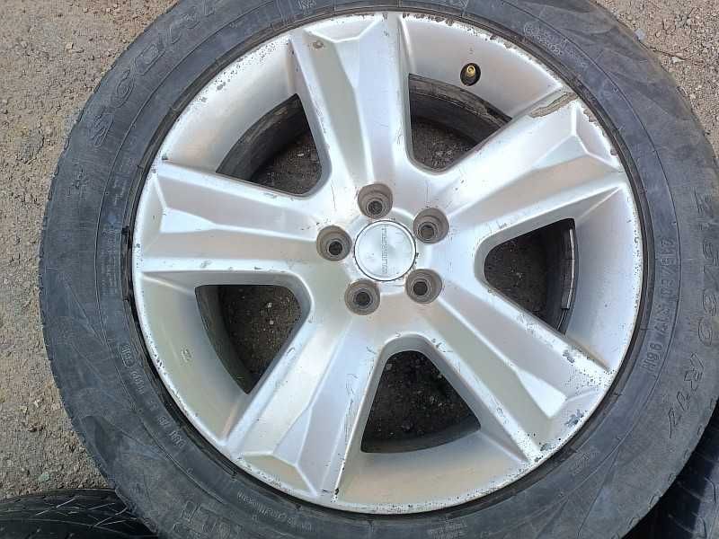 Продам оригинальные легкосплавные диски на Subaru