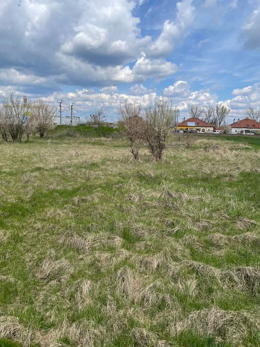 Vând/SCHIMB cu auto  imobil Teren 1000mp,intavilan,langa A2, CU sco
