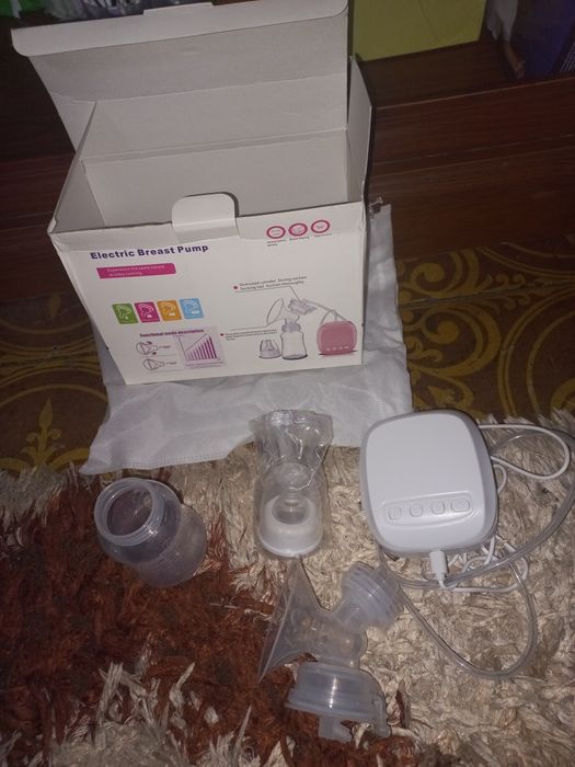 Продам электрический молокоотсос