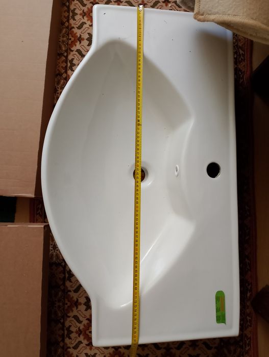 Бяла порцеланова мивка-намалявам