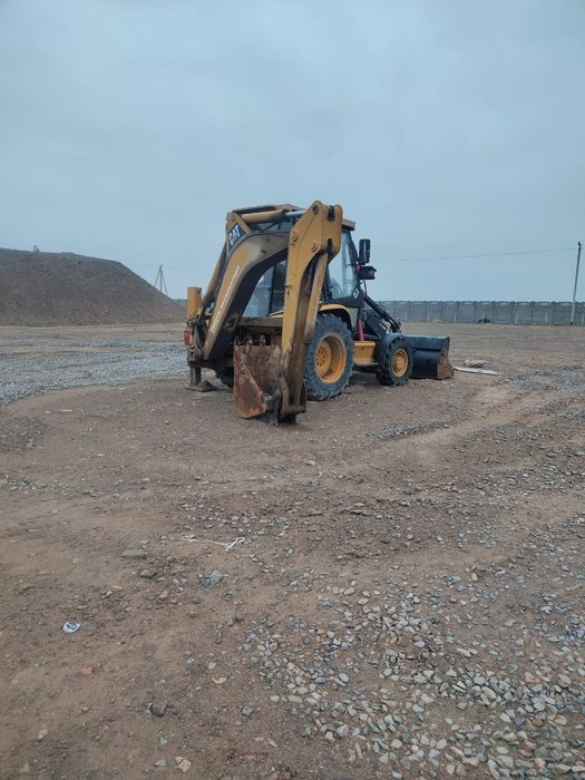 Продам Трактор 3в1 CAT 428C