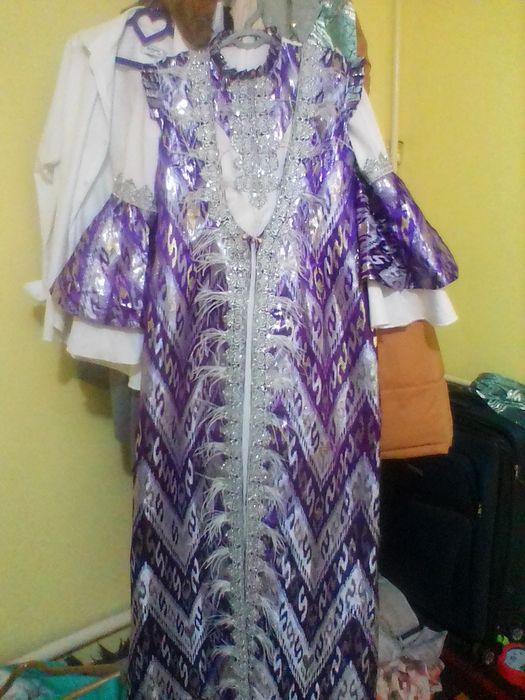 Ansambil kelinlar kiyimi