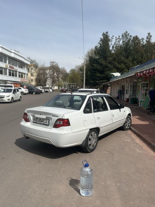 Нексия 2, белый цвет