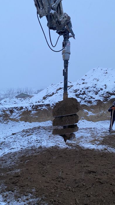 Экскаватор погрузчик три в одном