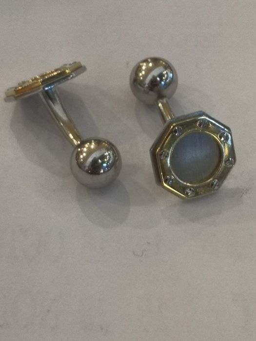 Vind butoni originali Cartier Santos aur 18t + otel