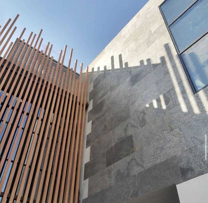 Натуральный каменный шпон на фасады и интерьер Оникс onix onyks