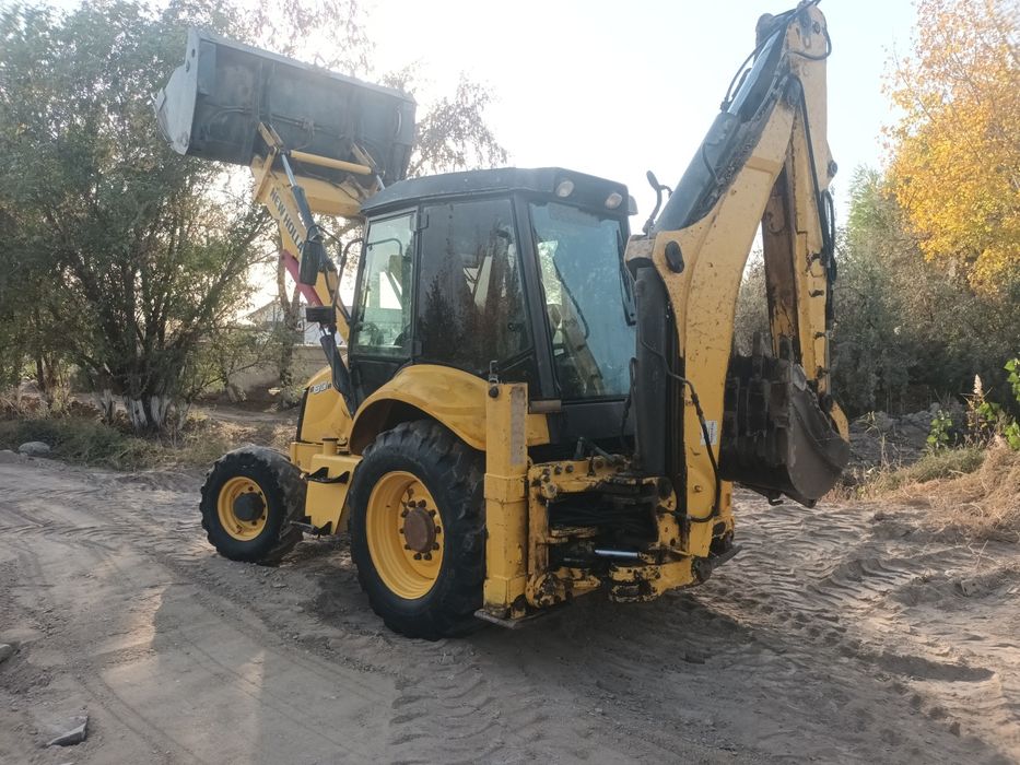 Йили 2011  моточасов 12000 new holland 330 миллон