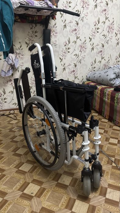 Инвалидная коляска