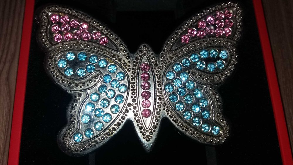 тока за колан пеперудата