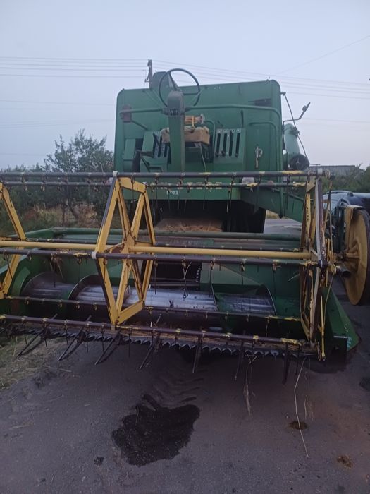 Vând john deere 430