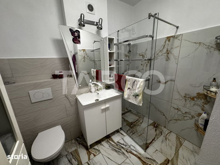 Apartament cu 3 camere 64 mp 2 bai 2 parcari gradina 63 mp boxa Sibiu