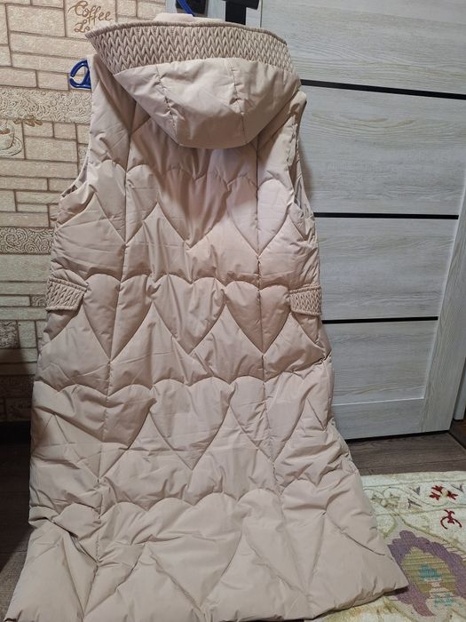 Утеплённые безрукавка.