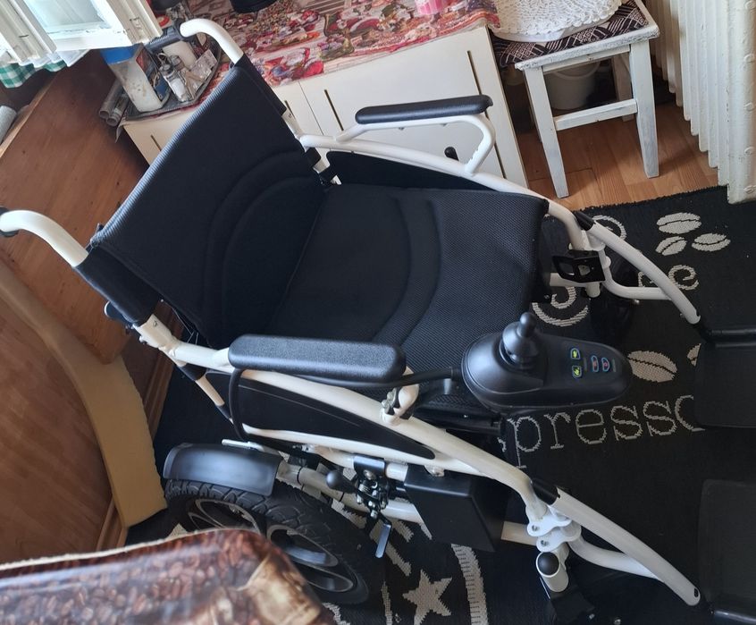 Carut pentru persoane cu dizabilitati electric