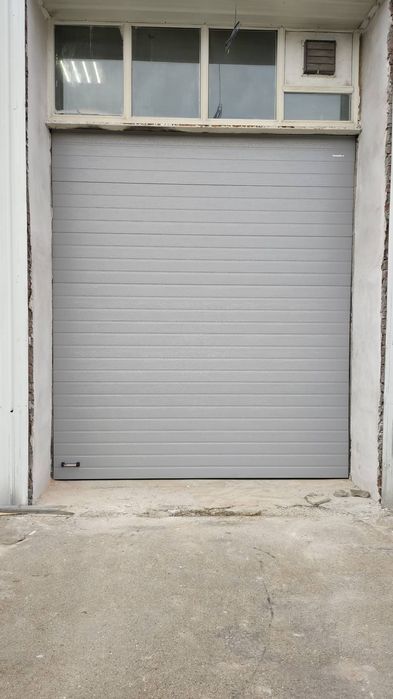 Секционные ворота Door Han