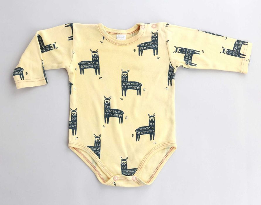 Лот от красиви бебешки дрешки от органичен памук на различни брандове.