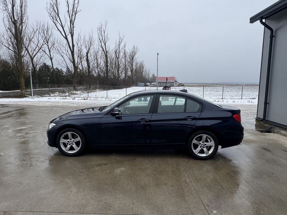 Bmw Faruri bi xenon/navigatie/senzori fata spate/jante/rate/garantie