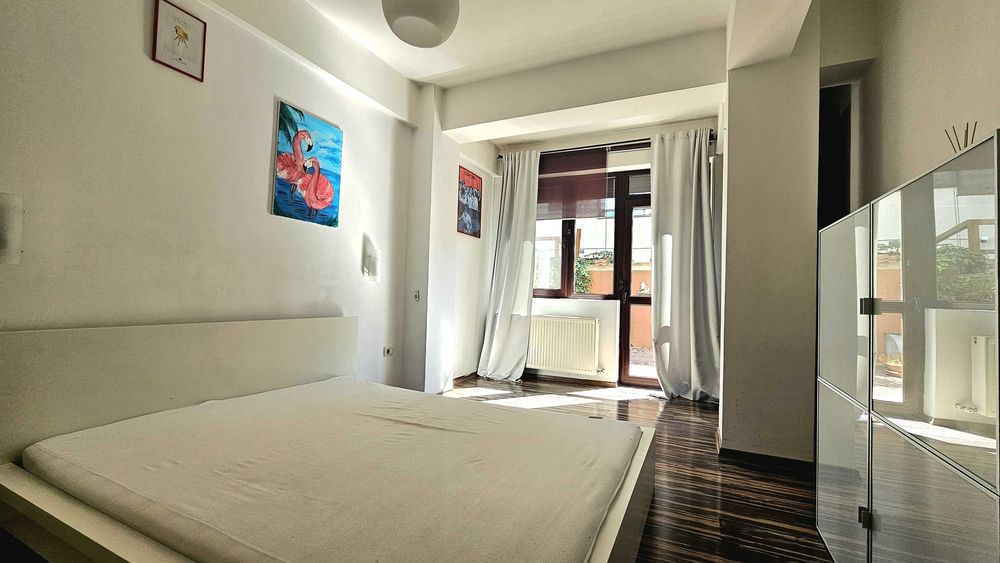 Inchiriez apartament cu curte