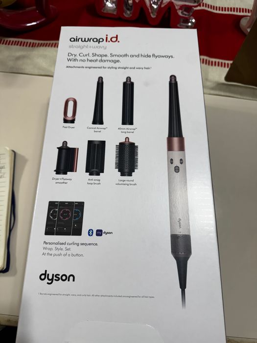 Dyson air wrap sigilat