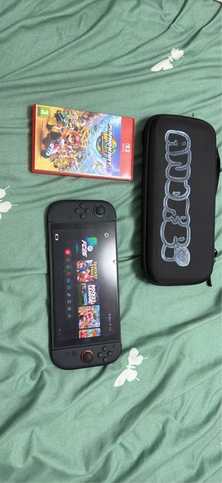 Nintedo switch 2 cu mario kart si fc 26 +carcasa si folie deja pusa oe consola