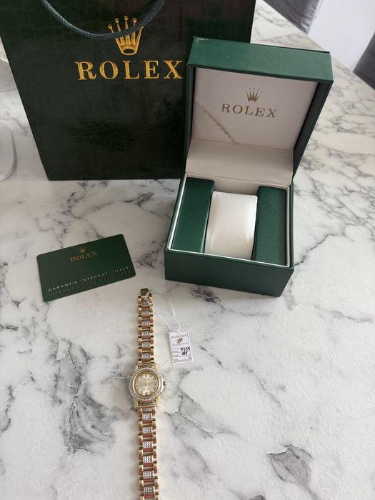 Продам золотые часы Rolex