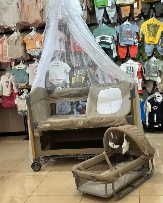 Kidilo 4в1: кроватка, манеж, люлька и пеленальная зона.