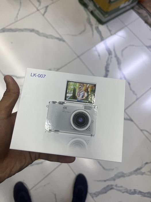 Фотоапарат новая