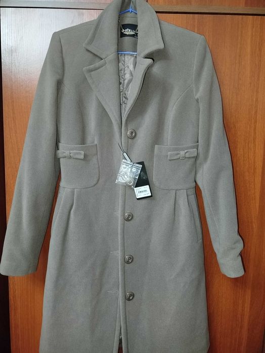 Пальто совершенно новое