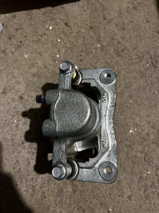 Суппорт задний левый SsangYong Kyron