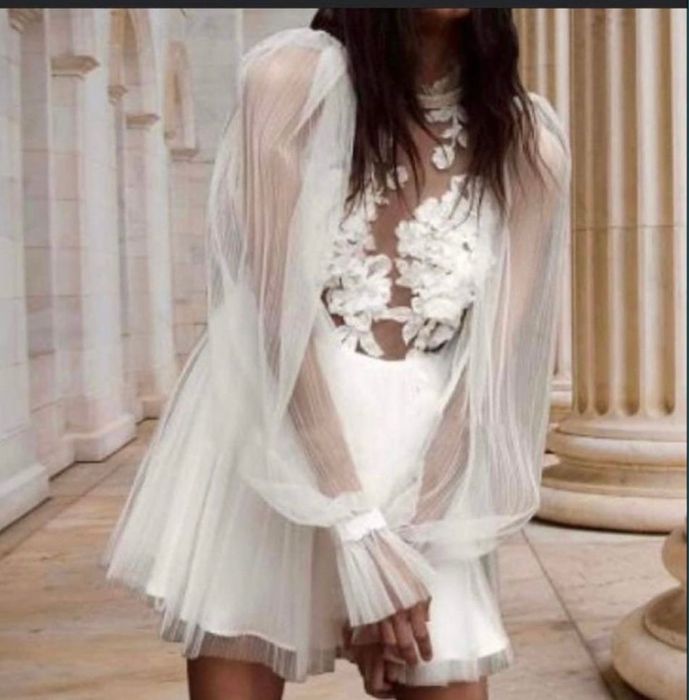 Елегантна бяла рокля