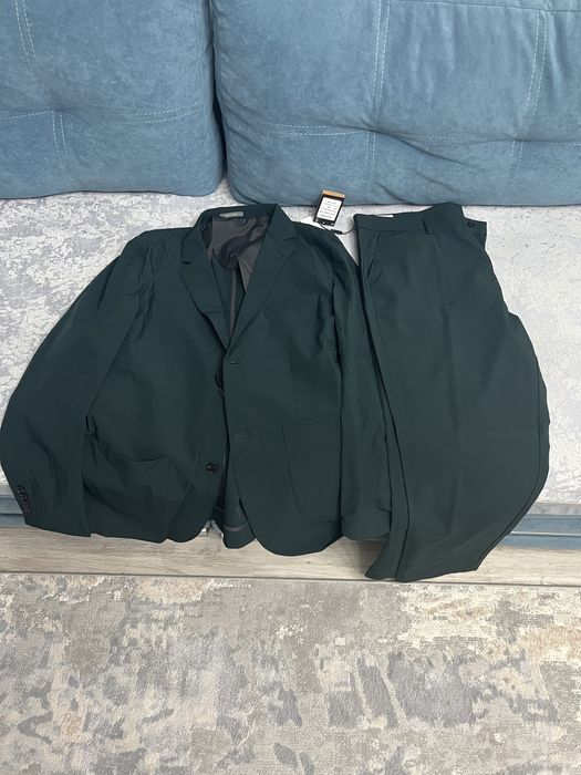 Костюм новый не носил