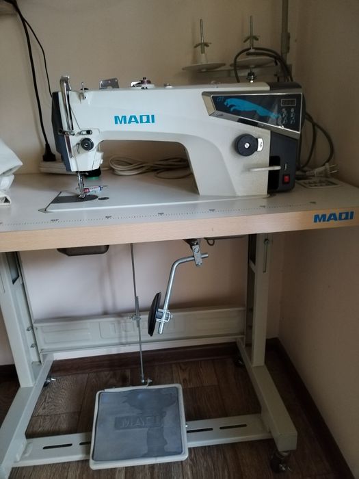 tikyv mashinasi MAQI bir chok yangidek  holatda