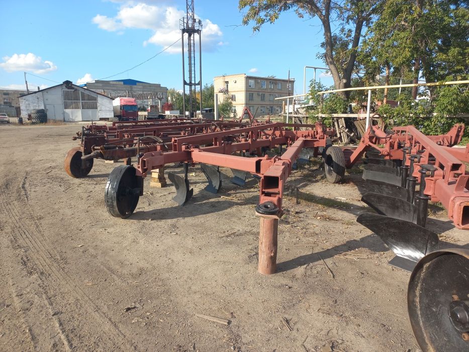 Плуг 9корпусный прицепной