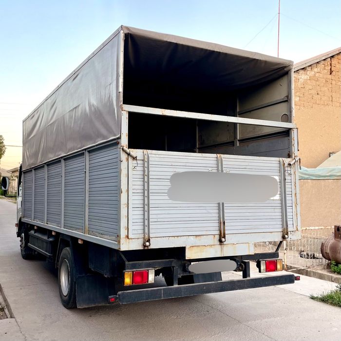 ISUZU Бортовой с тентом