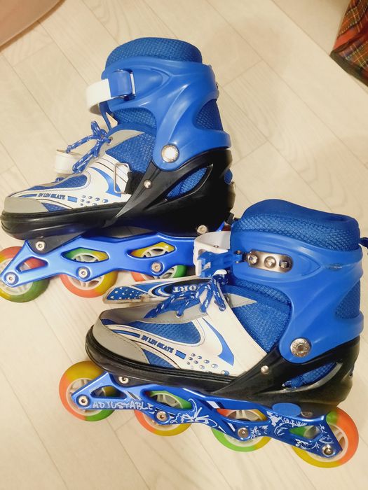 Роликовые коньки