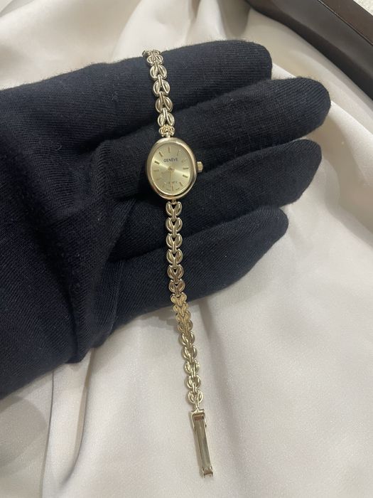 Золотые женские часы