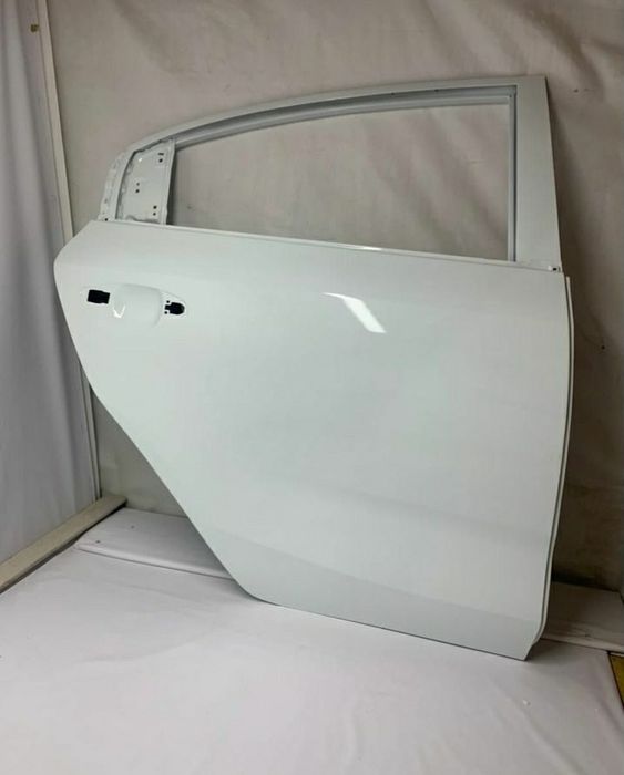 двери кия Рио в цвет