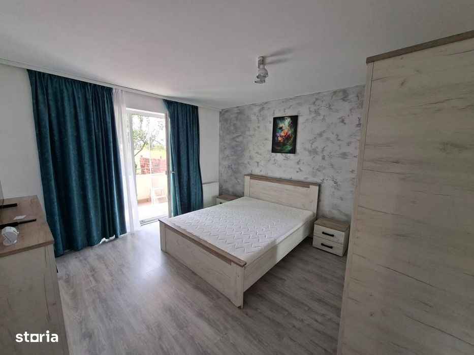 Garsoniera de inchiriat mobilata si utilata cu gradina in Sanpetru