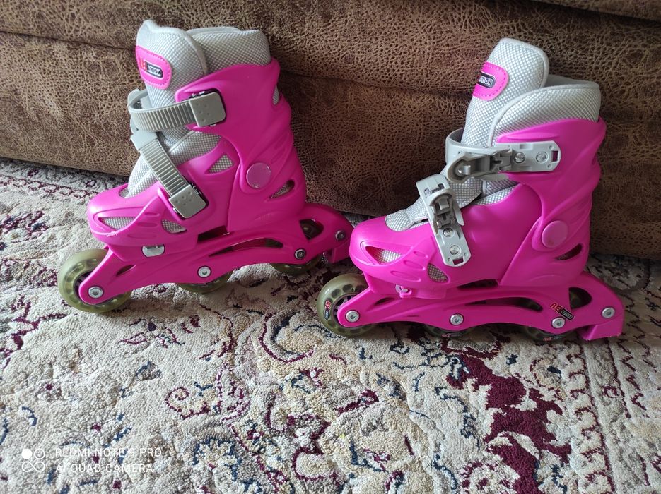 Роликовые коньки