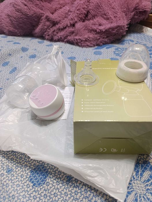 Электрический молокоотсос б/у