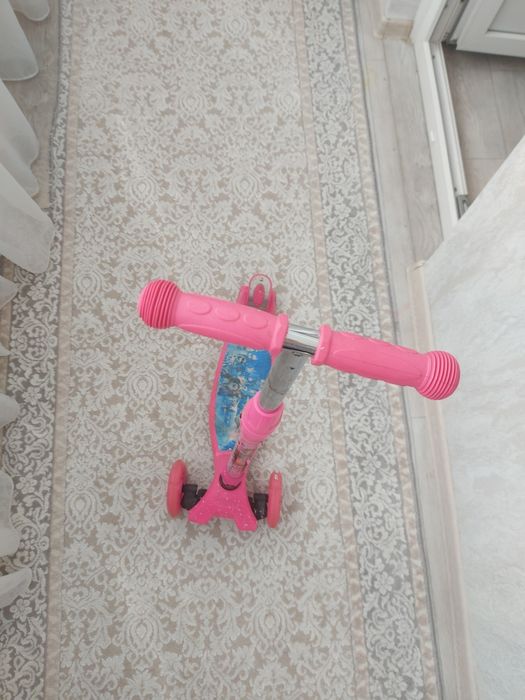 Самокат для девочки до 7 лет