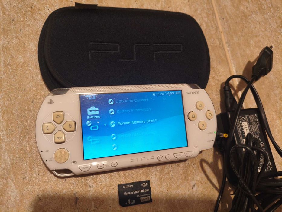 joc pt. copii PSP complet cu alimentator,card si un joc - stare f buna.