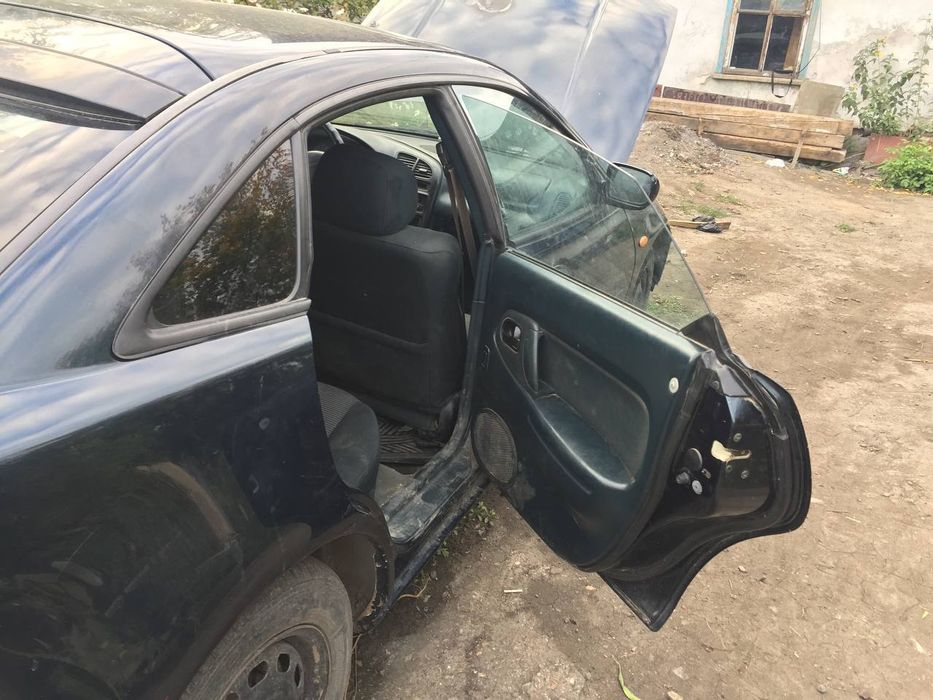 Продам Мазду 323