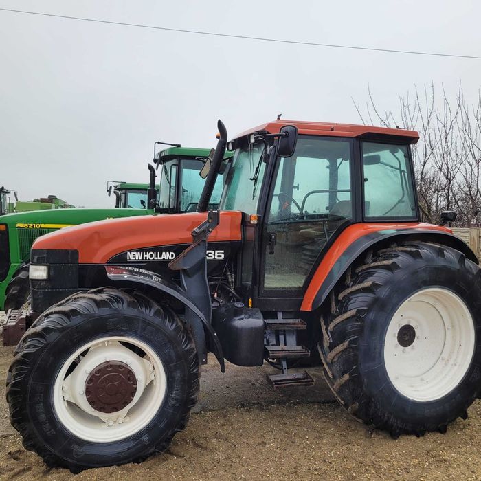 New Holland M135dt, AC, an 2000, incarcator frontal Faucheus cu 2 cupe