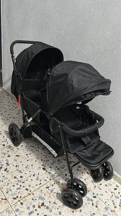 Двухместная коляска