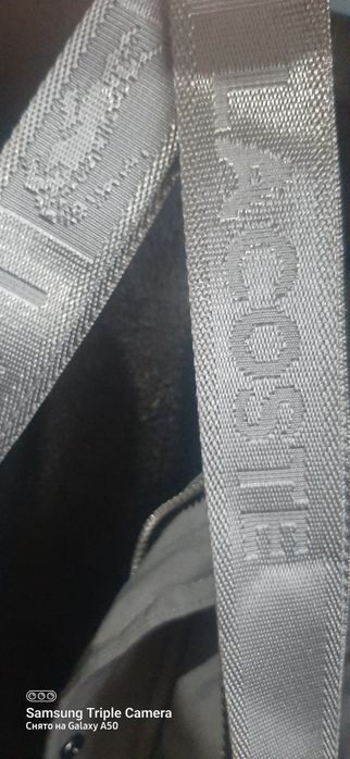 Нагрудная сумка от Lacoste