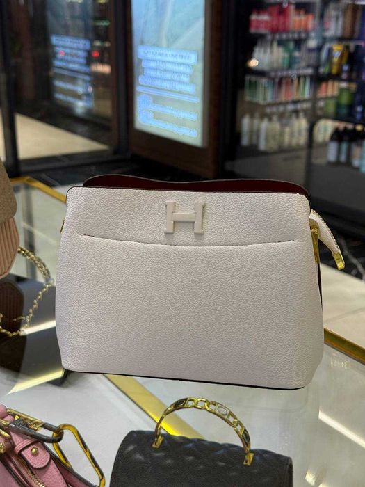 Ayollar uchun ixcham va bejirim sumkalar