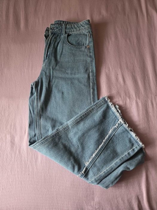 Новые джинсовые брюки